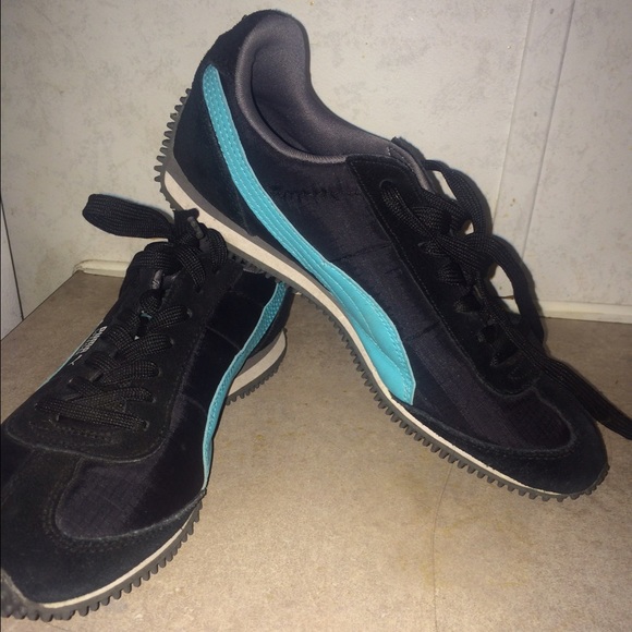 Black and Teal Pumas