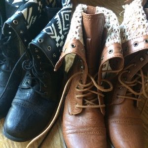 TWO pairs of lace up boots