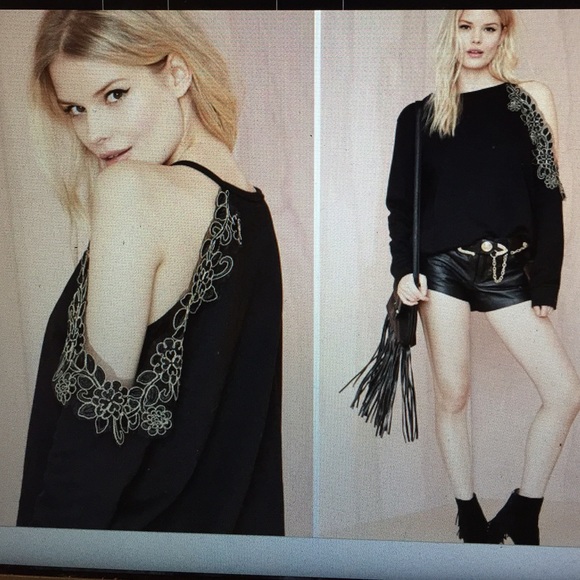 Embroidered off shoulder top