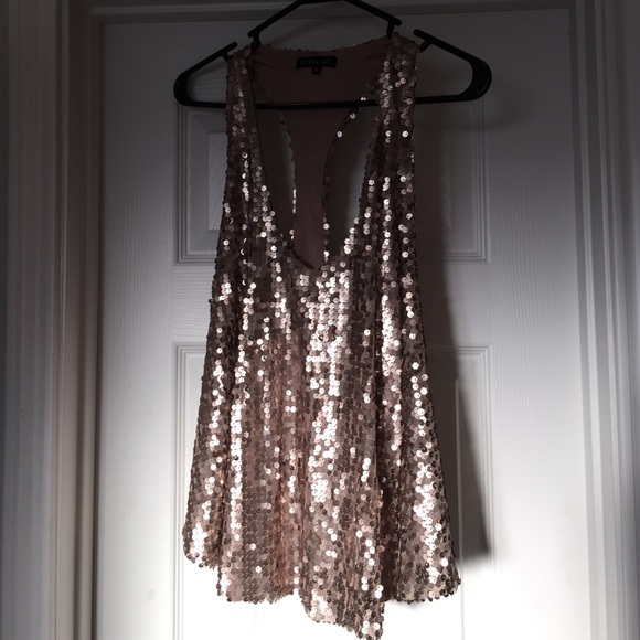 Sequined rose gold loose fitting top.