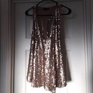 Sequined rose gold loose fitting top.