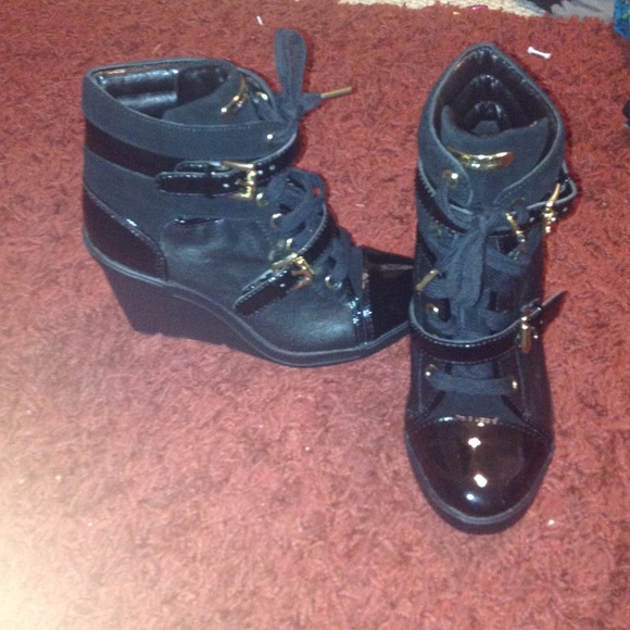 Black and gold MK sneaker wedges