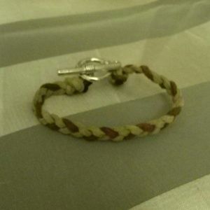 Handcrafted braided bracelet with silver clasp