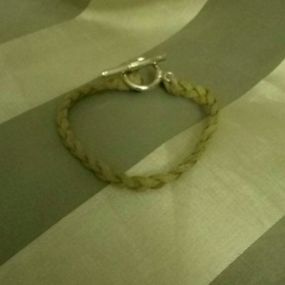 Handcrafted braided bracelet with silver clasp