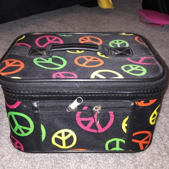 medium cosmetic case with peace signs