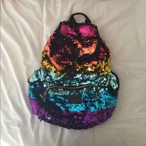 Rainbow vs pink backpack