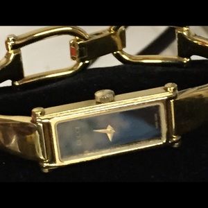 Bangle gold watch