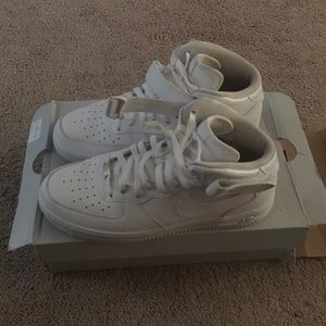 All white mid Air Force 1s