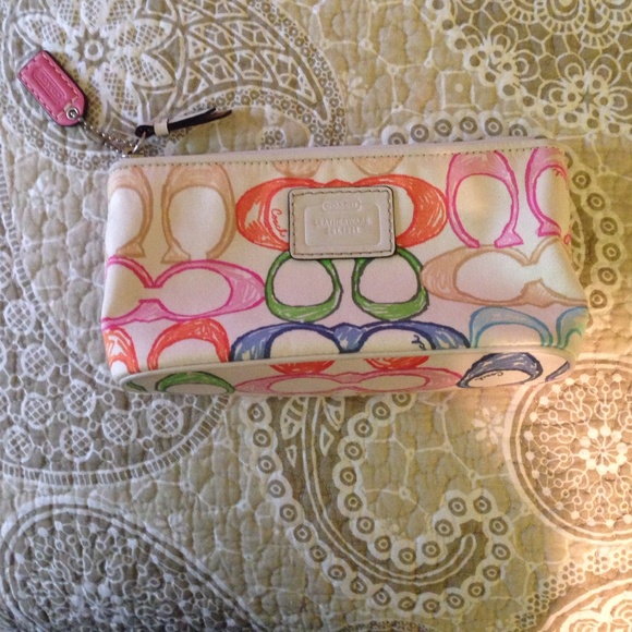Small Coach makeup bag. Never used