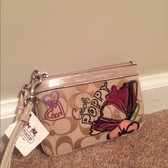 Poppy coach wristlet - on hold for buyer