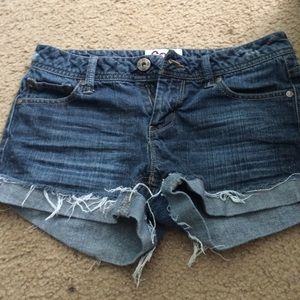 Distressed blue shorts