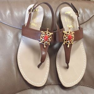 Miss Trish of Capri gold turtle sandals