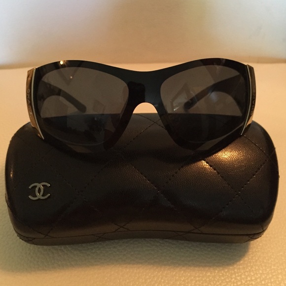 Authentic Chanel sunglasses with gold accent