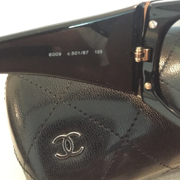 Authentic Chanel sunglasses with gold accent