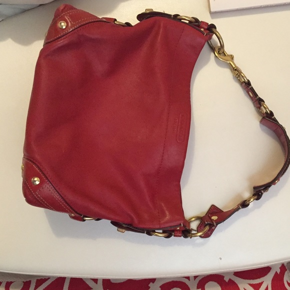 Red medium sized Coach purse