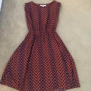Orange and navy blue chevron print dress