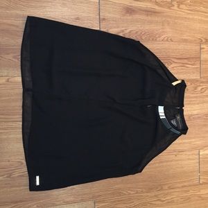 Black shirt from the Kim Kardashian Kollection