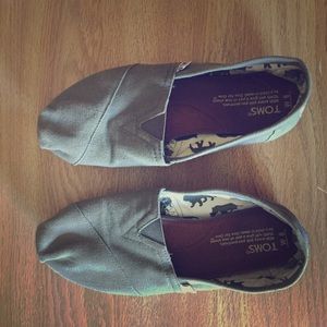 Olive green TOMS slip ons, gently worn