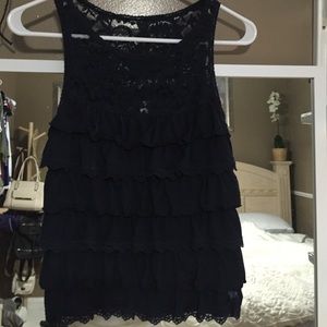 Navy blue ruffle top with lace detailing