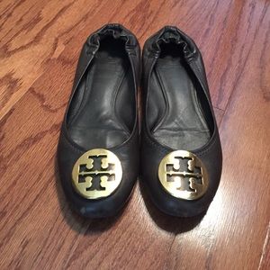 Dark brown with gold emblem Tory reva