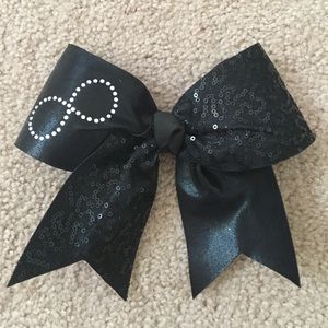 Black sequined infinity bow