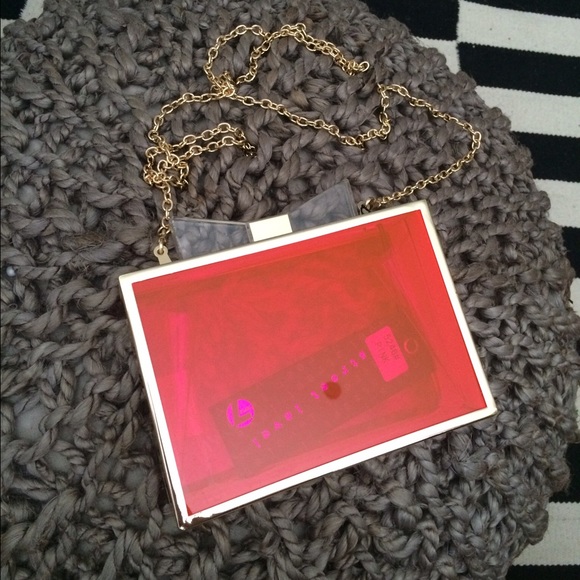 Pink and gold lucite clutch