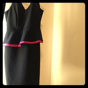 Black and pink peplum dress by Nicole size XL.