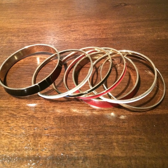 Red, black, white, and gold bangle set
