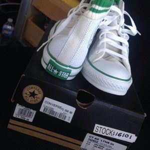 Green and white Converse High Tops