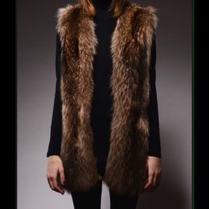never worn) fur vest FAUX  FUR