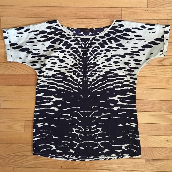 The limited navy and creme print blouse