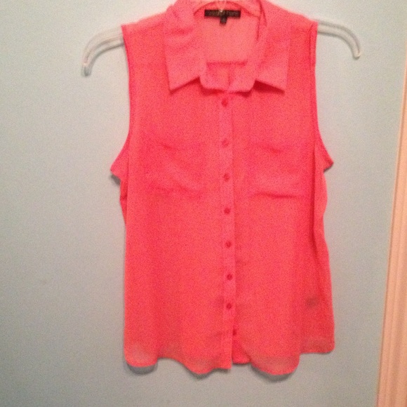 Sleeveless pink shirt very see through