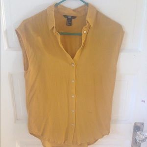 Sleeveless yellow shirt