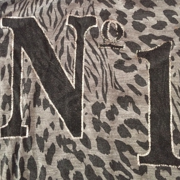 Cheetah print shirt.