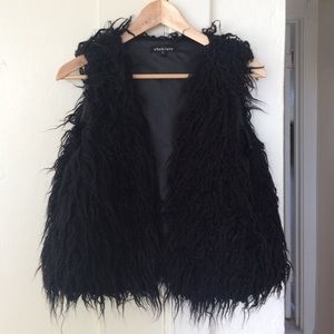 black faux fur vest