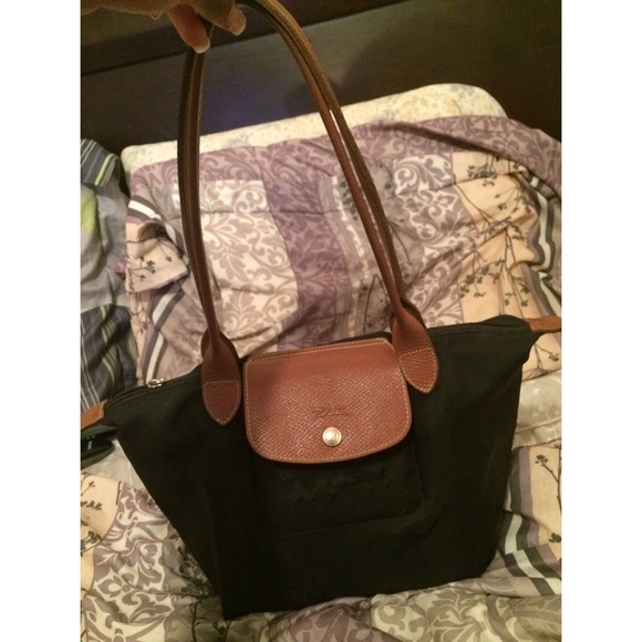 Black Longchamp bag. $55 on 〽️erc