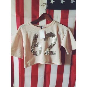 Blush tone cropped knit