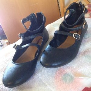 Black flats with straps