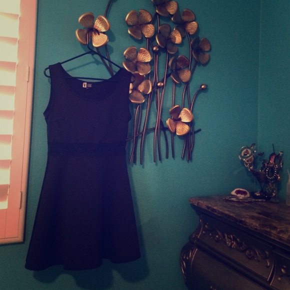 Black dress with see through waist portion