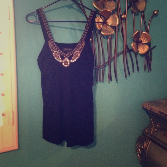 Black sleeveless top with sequin design in front