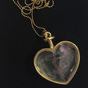 Glass heart with dried flowers