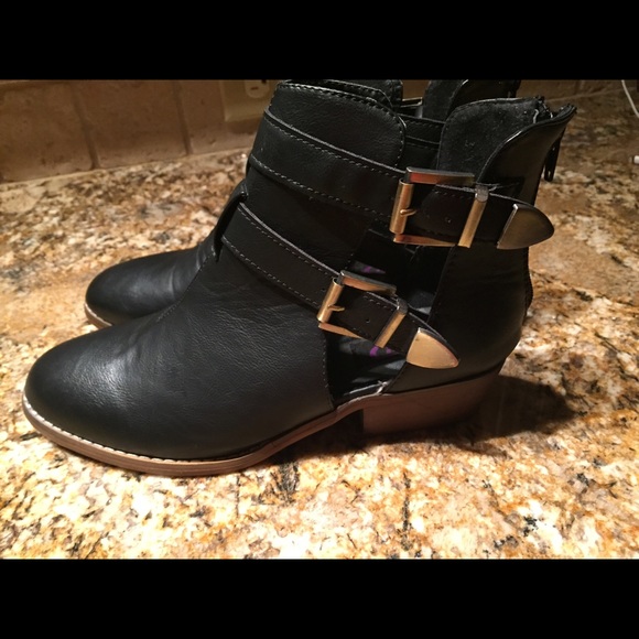 Black Cutout booties with buckles and a low heel