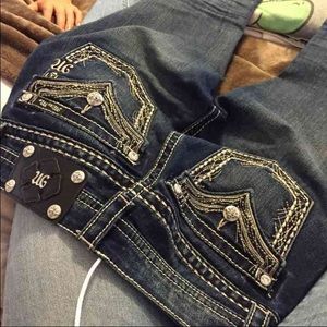 Dark Wash Miss Me's.