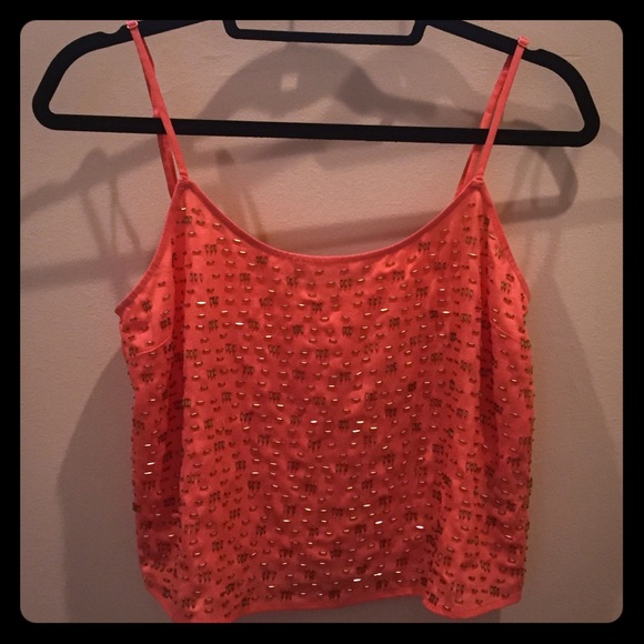 Pinky/peachy top with gold accents