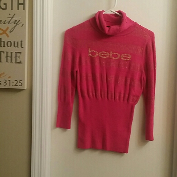Bebe three quarter sleeve sweater...