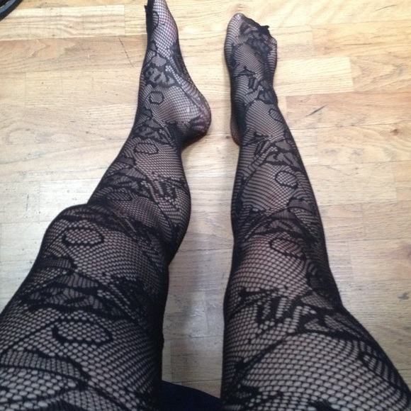 Four pairs of fishnet stockings various designs