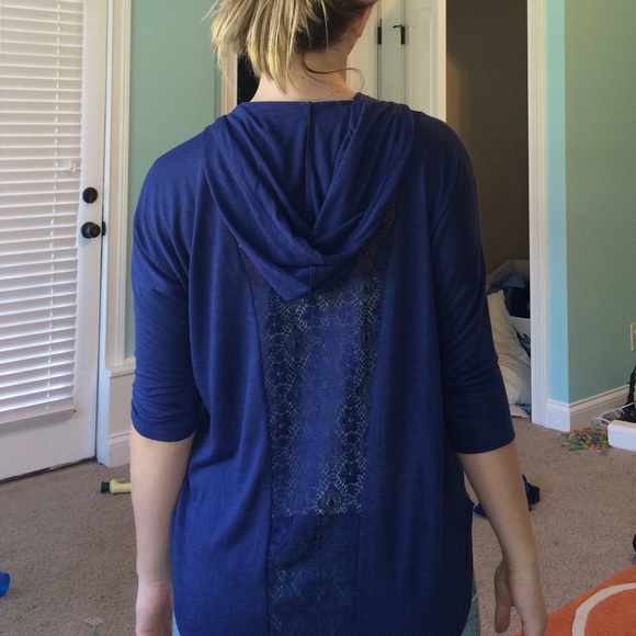 A navy blue sweatshirt. (Worn once or twice)