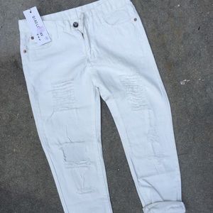 White distressed boyfriend jeans