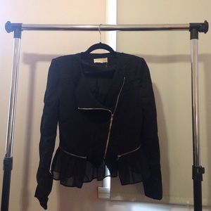 Black Peplum Style Jacket With Silver Hardware
