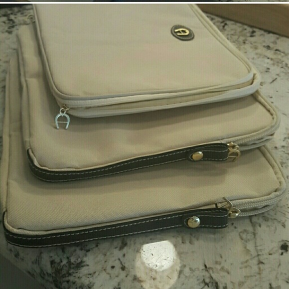 Great gifts! THREE Aigner canvas cases